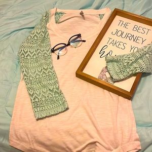 I am selling a shirt the  brand is vanity the color is white and a teal